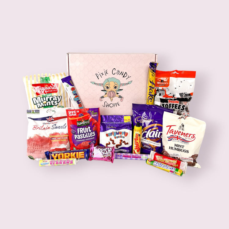A birthday themed pixie's magical mystery box with it's contents displayed in front.