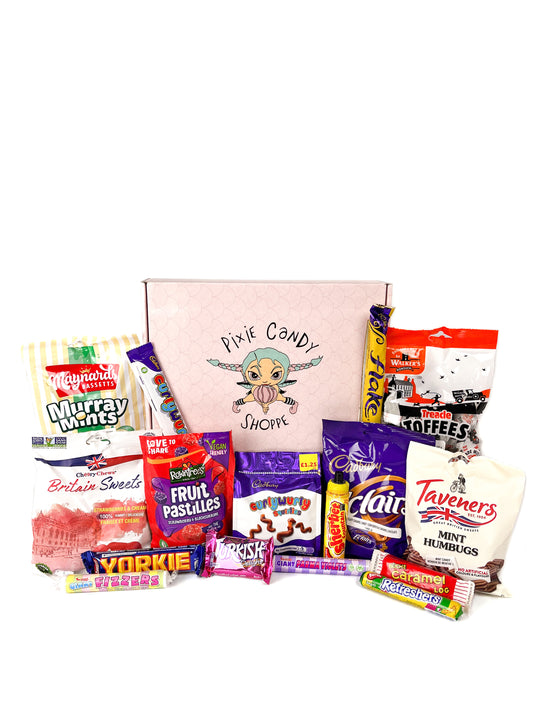 A collection of candy and chocolates from the UK placed in front of a pixie candy branded pink box to show the possible contents of a pixie candy magical mystery box.