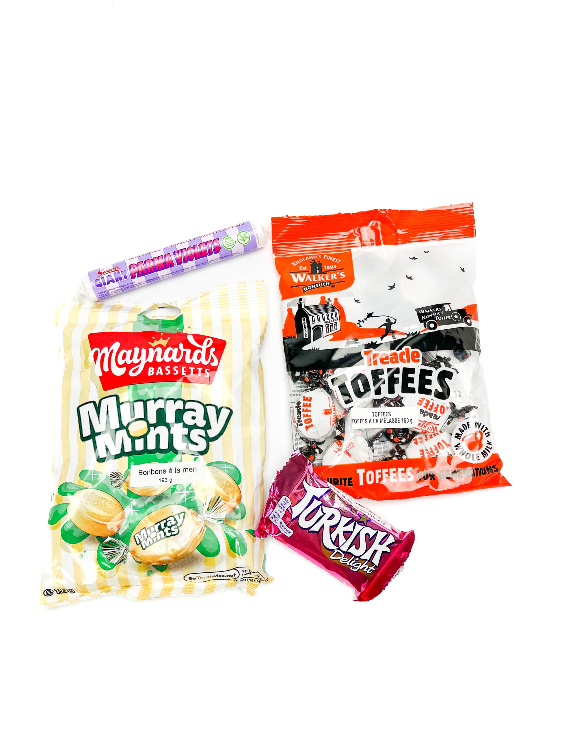 A package of maynards murray mints, treacle toffeess, parma violets, and a turkish delight bar displayed on a white background.
