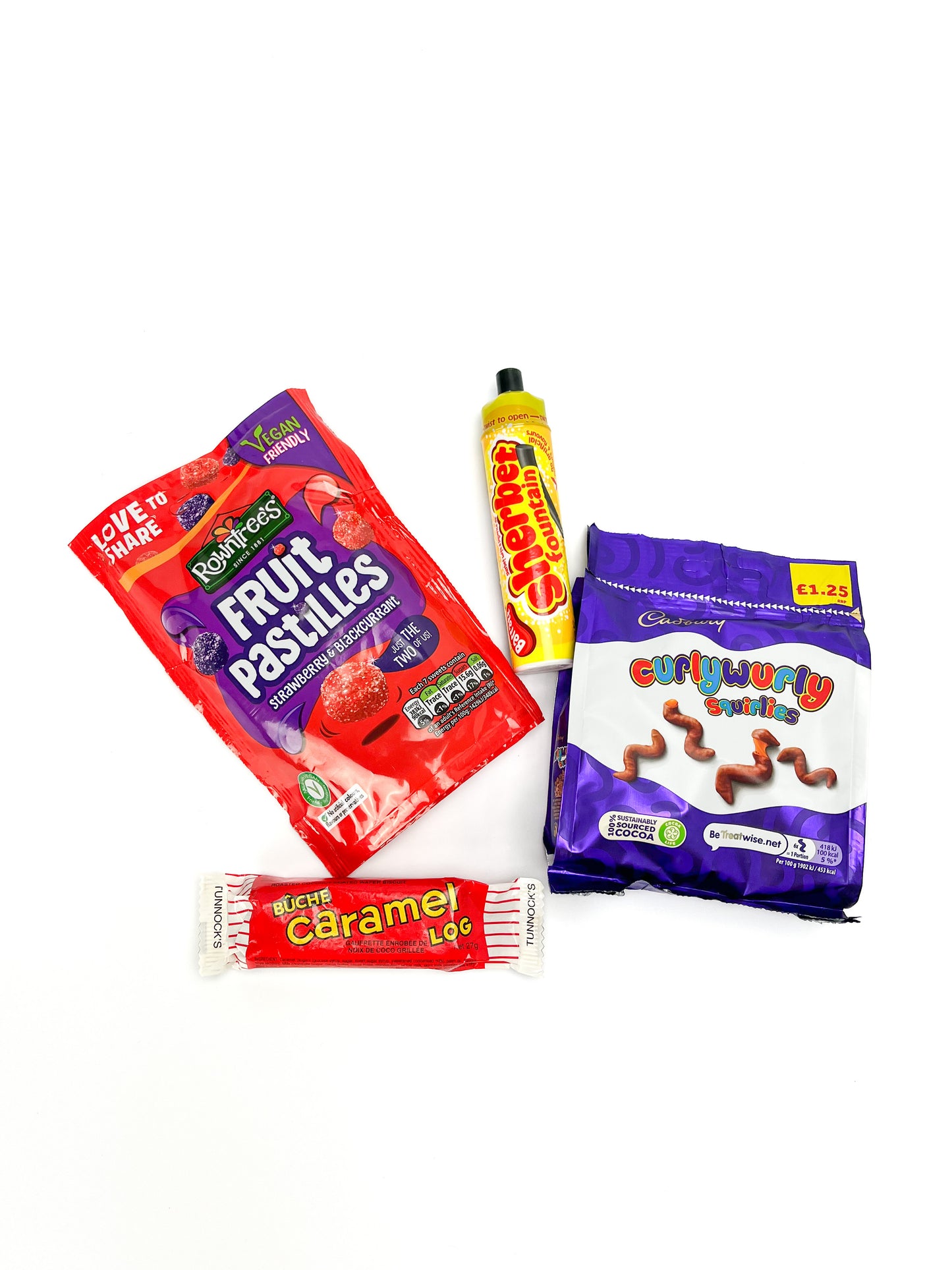 A package of cadbury curlywurly squirlies, caramel log, rowntree's fruit pastilles, and a sherbet fountain displayed on a white background.
